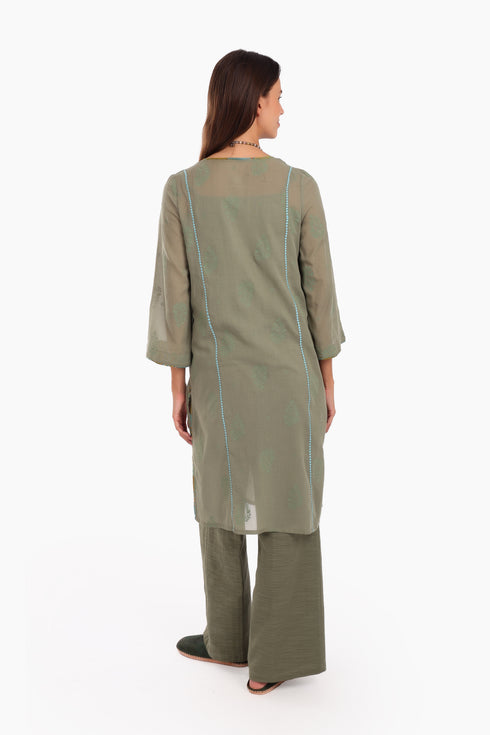 Embroidery tunic with contrast color piping in printed cotton voile